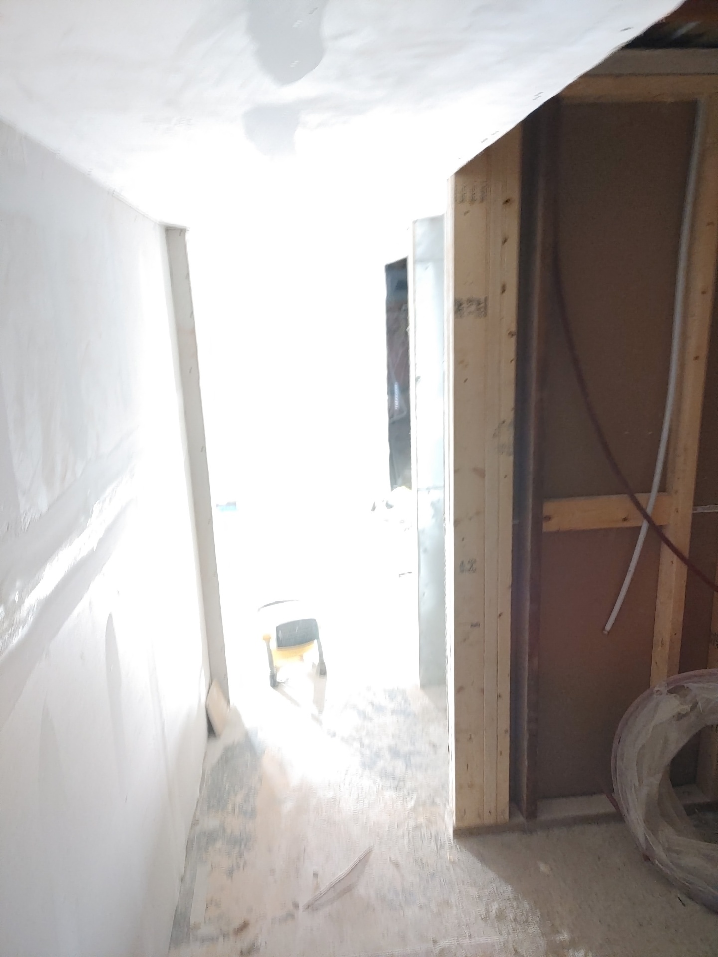 Poly-wrapped doorway during dust control