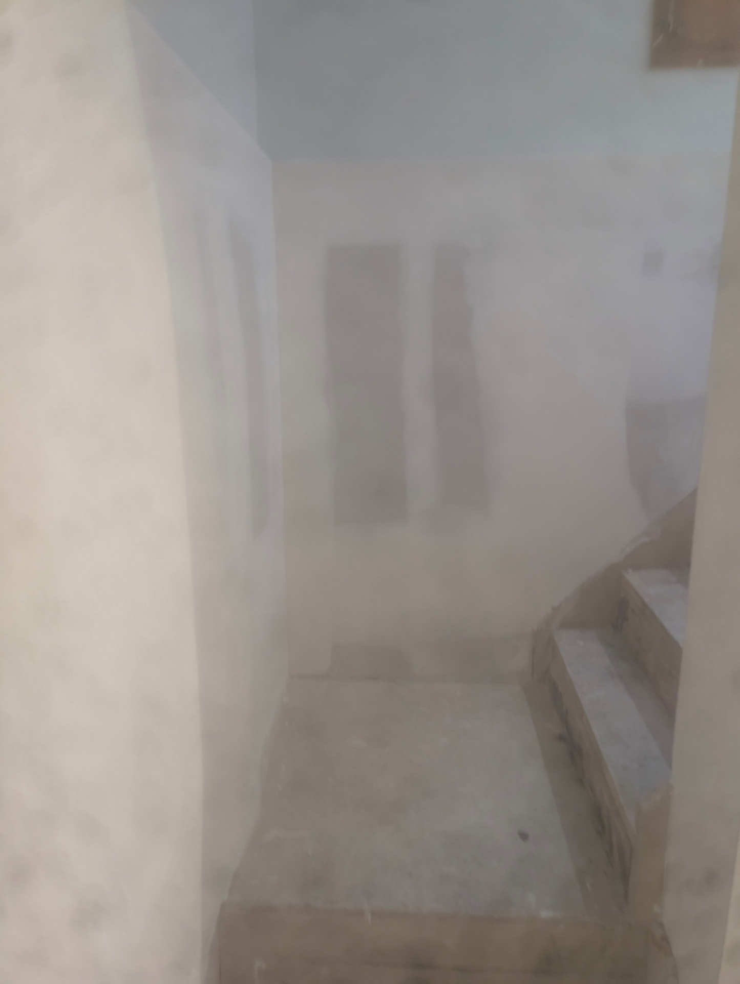 Smooth Level 5 drywall finish in a residential hallway