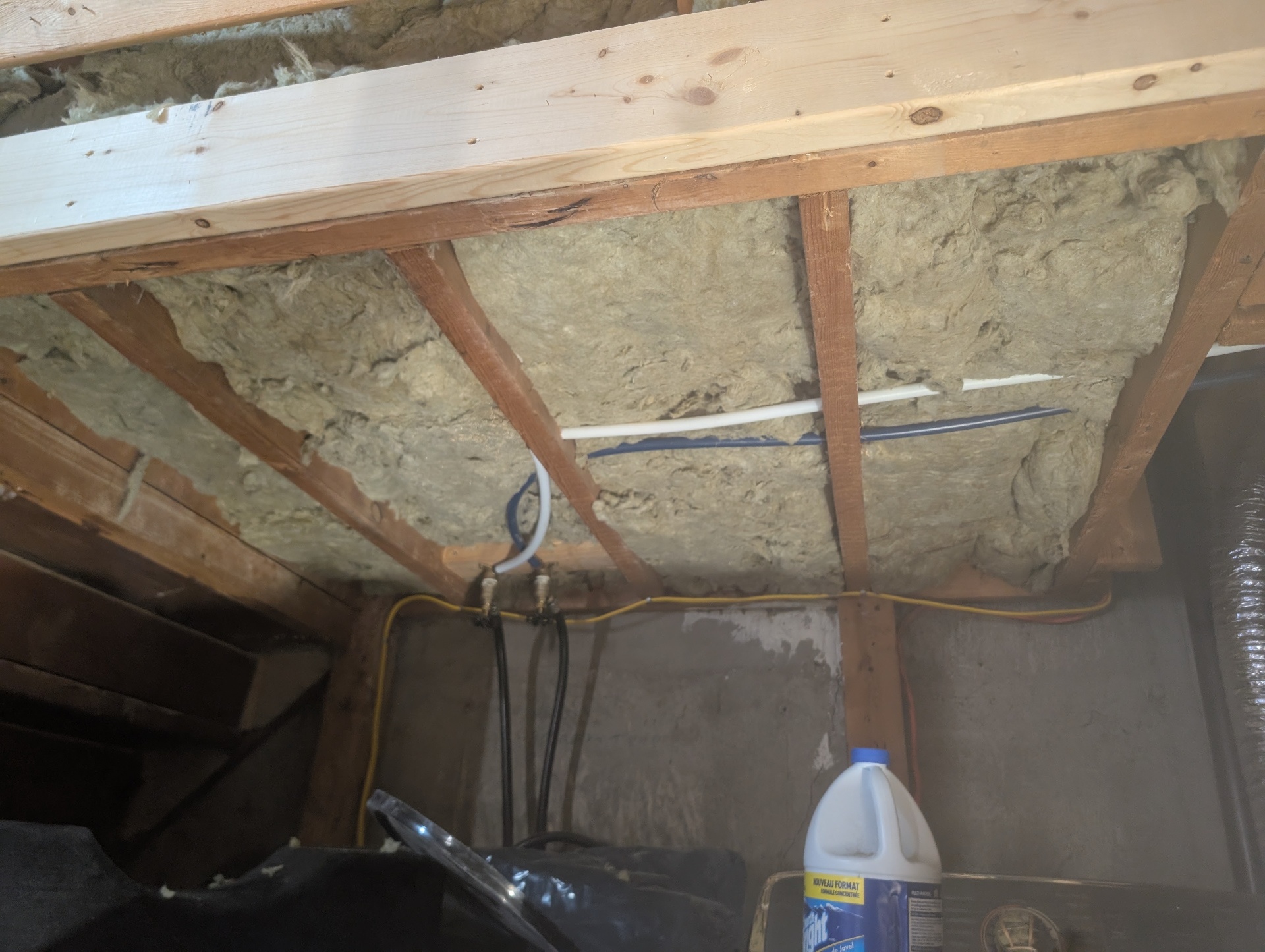Before — basement ceiling insulation prep