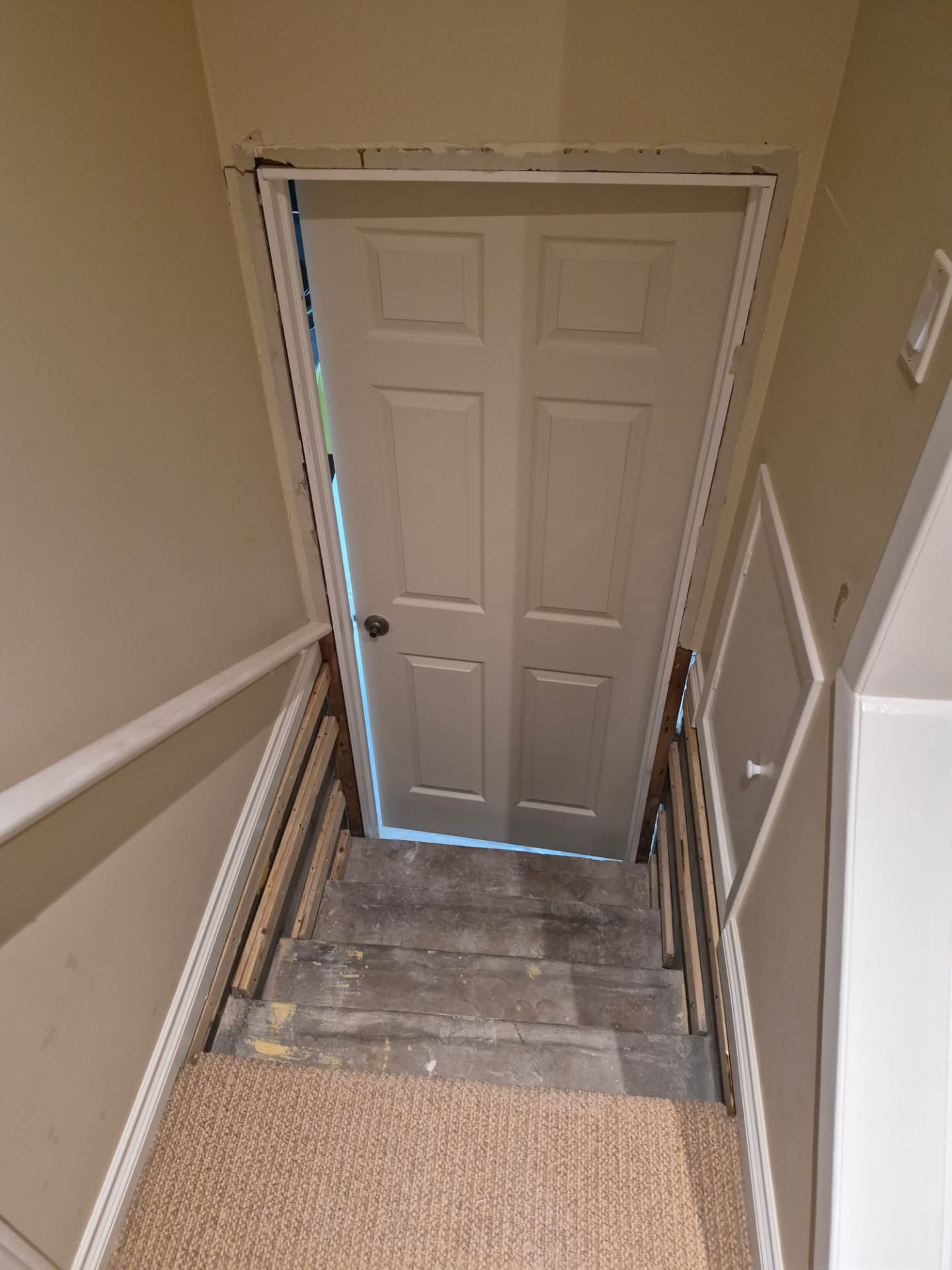 New jambs and shims at the stair door