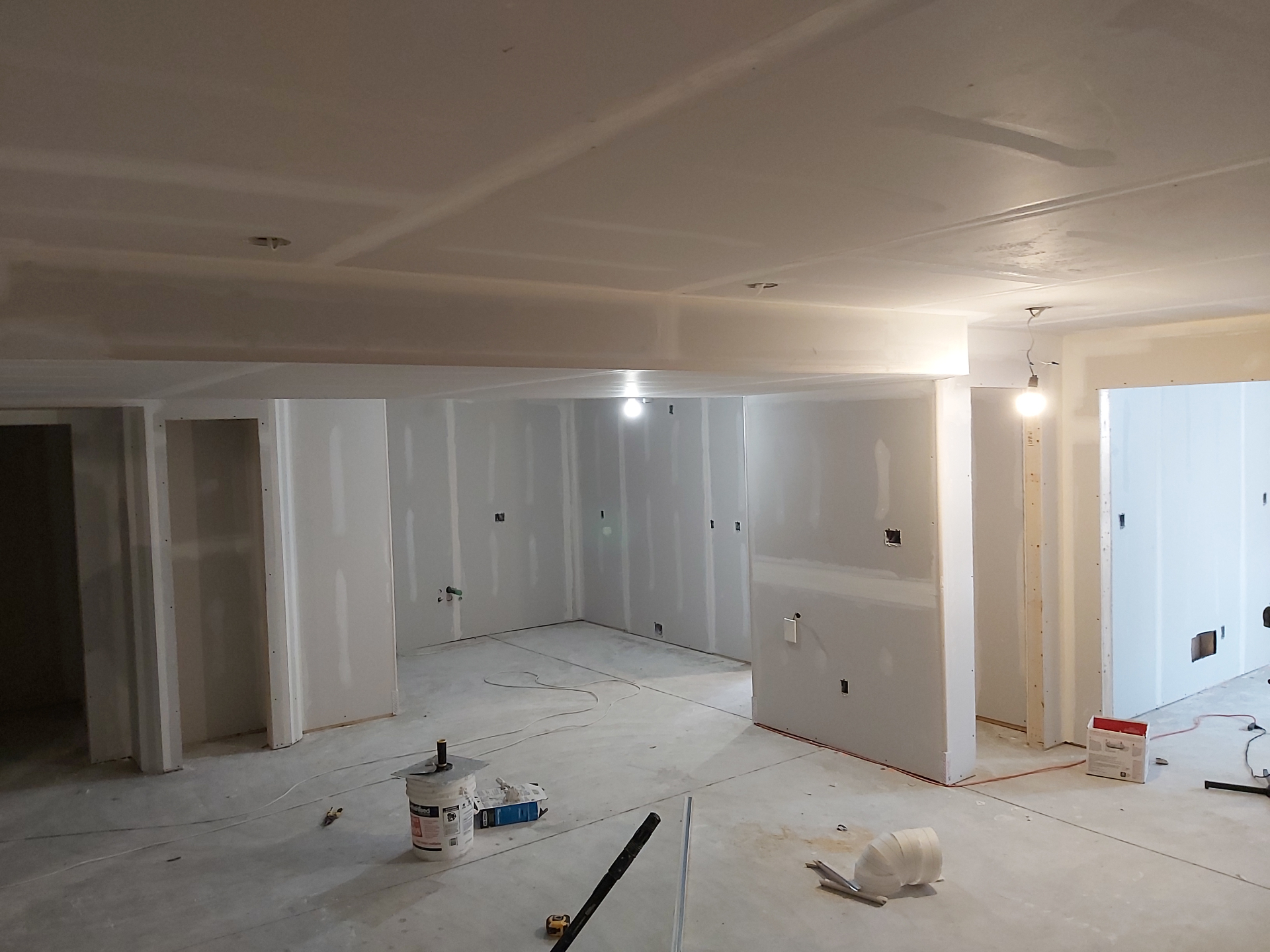 Basement rec room taped and primed