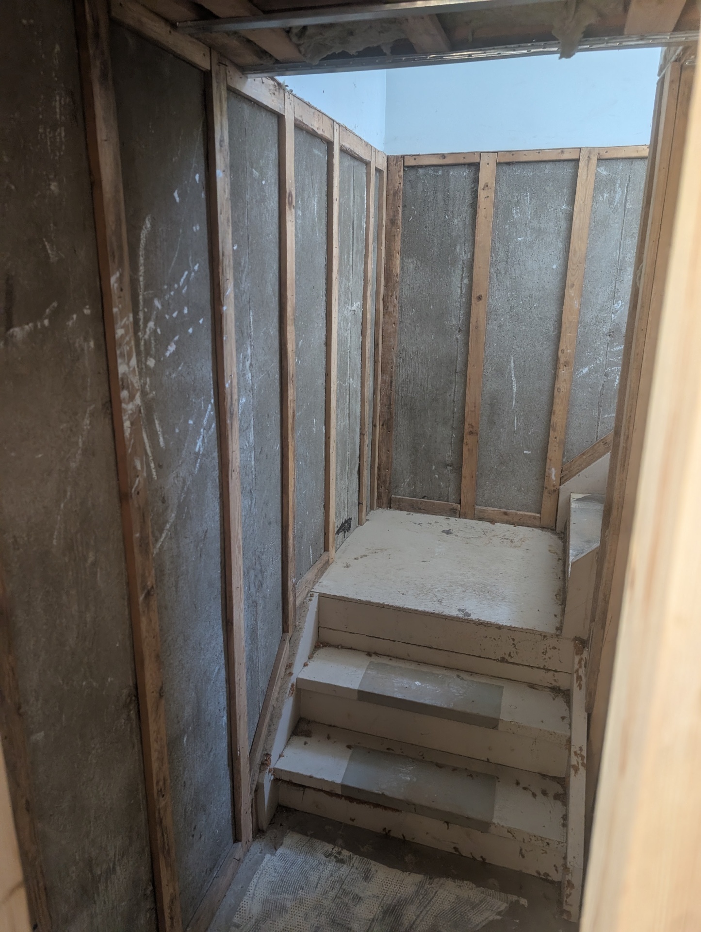Basement stairwell — before
