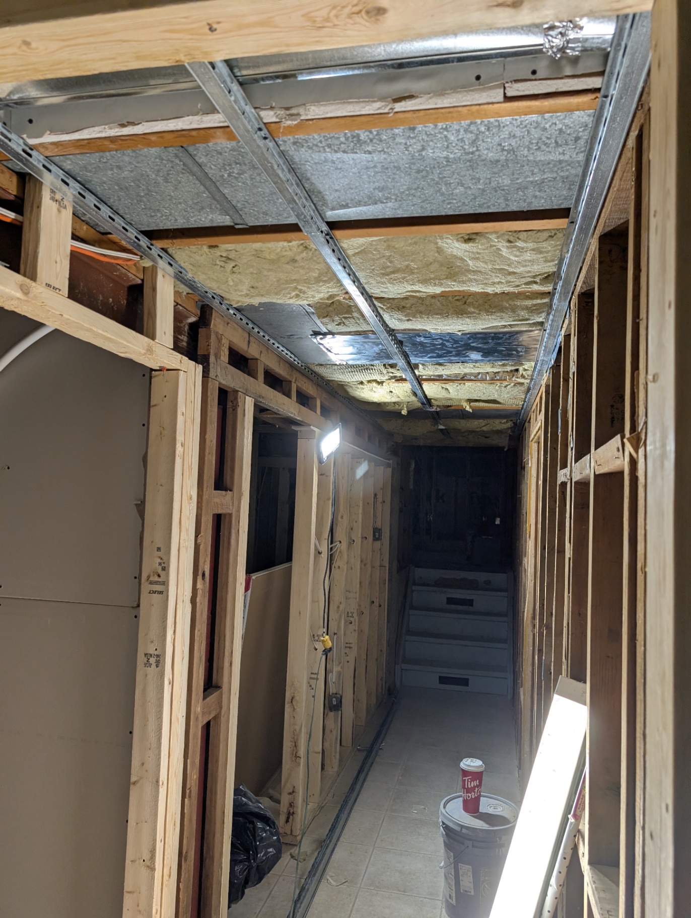 Before — hallway framing & ceiling strapping