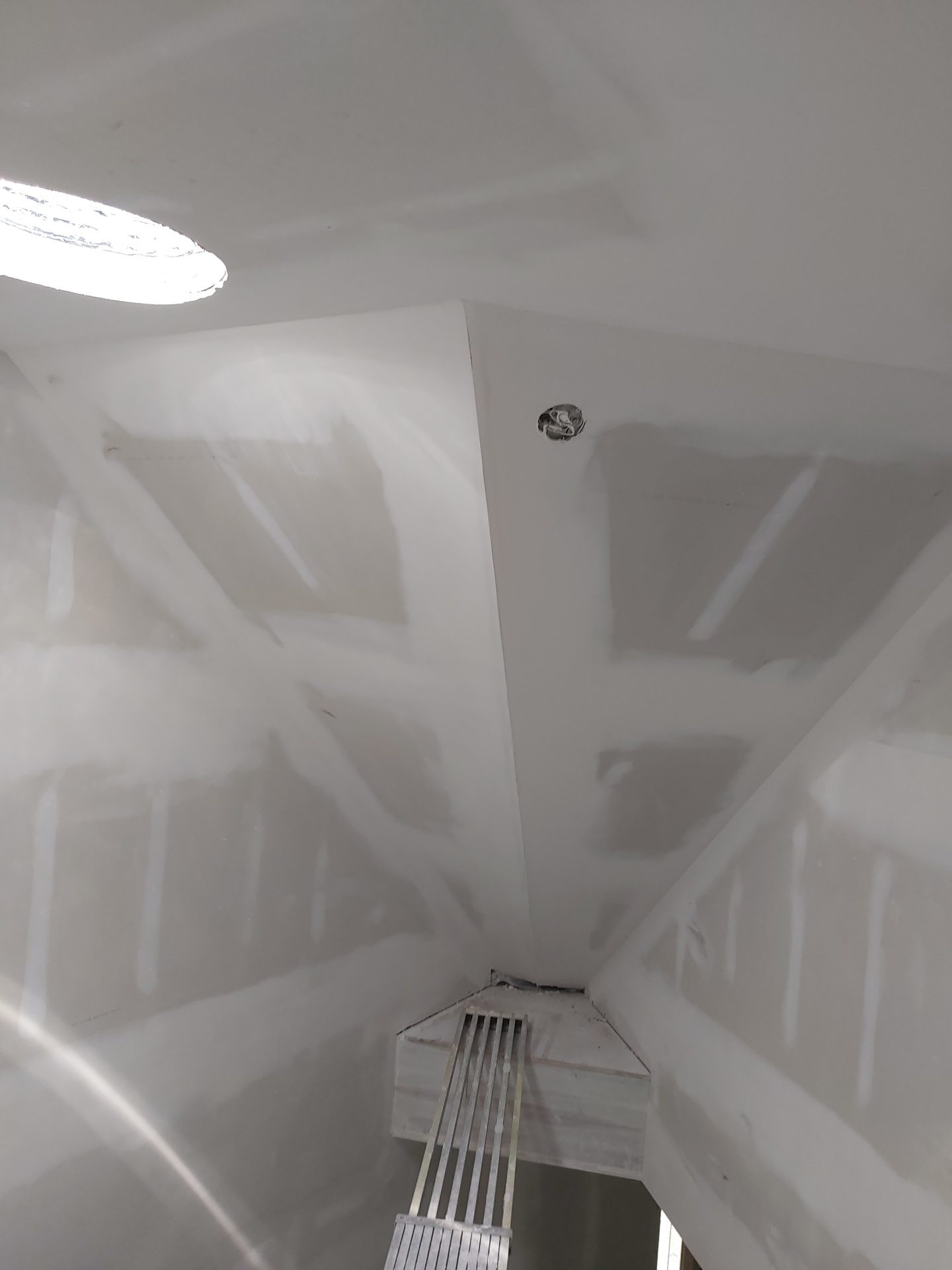 Cathedral ceiling peak with drywall seams sanded smooth