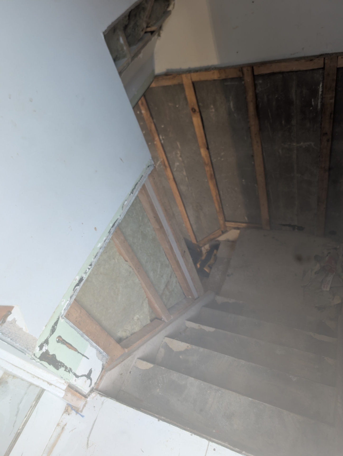 Before — stairwell opened up for reno