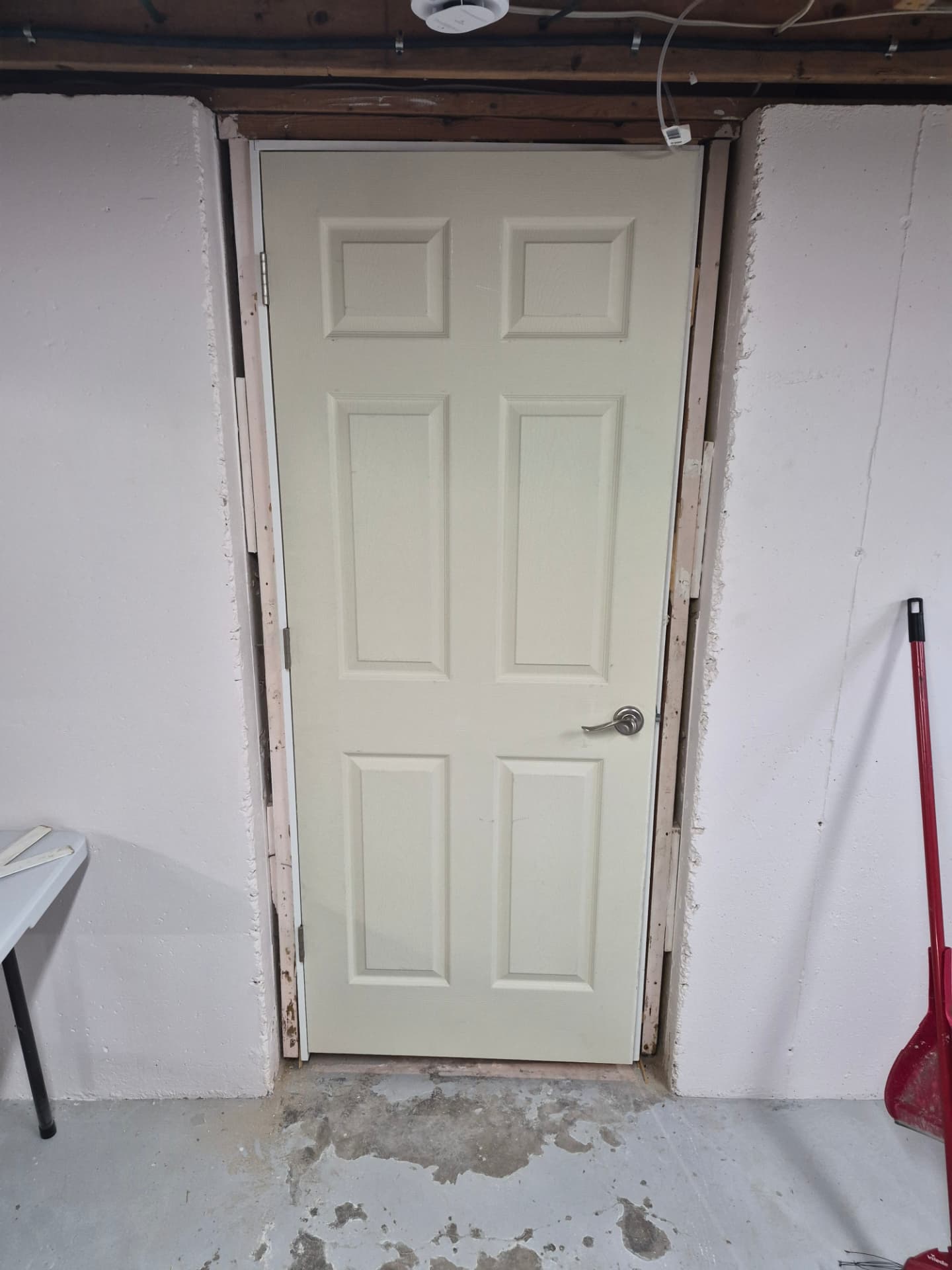 Basement door set in a rebuilt opening
