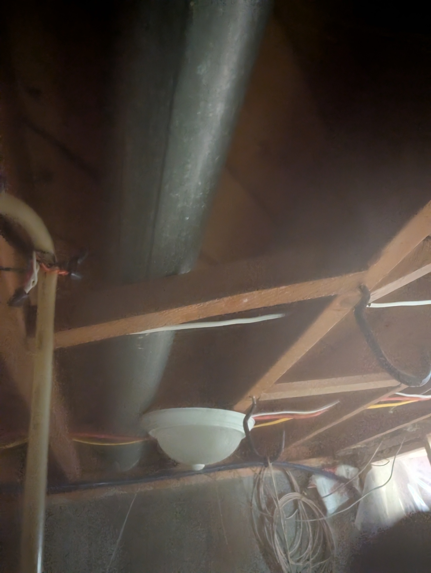 Before — crawlspace utility inspection