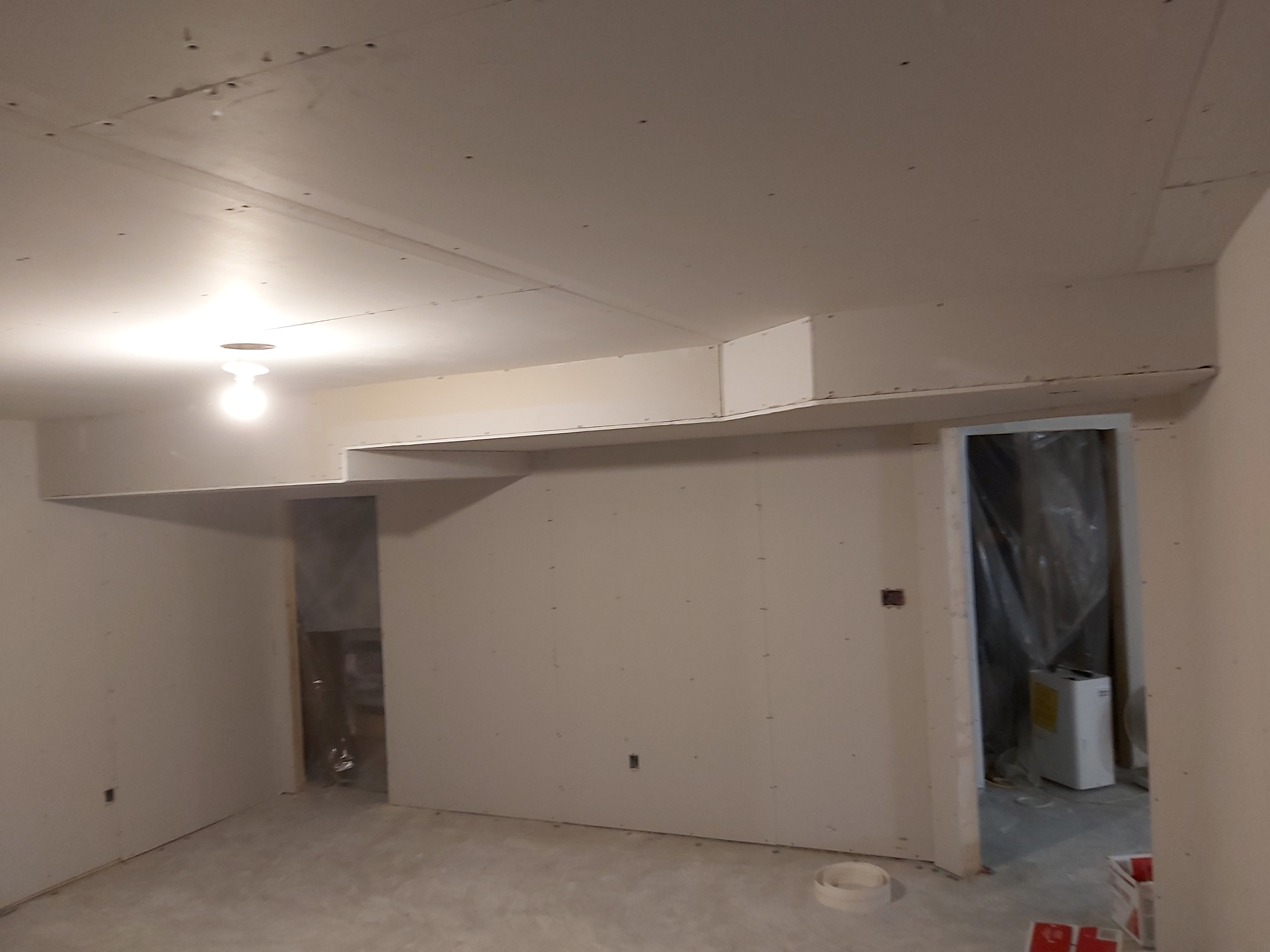Drywall wrapped around ductwork bulkhead