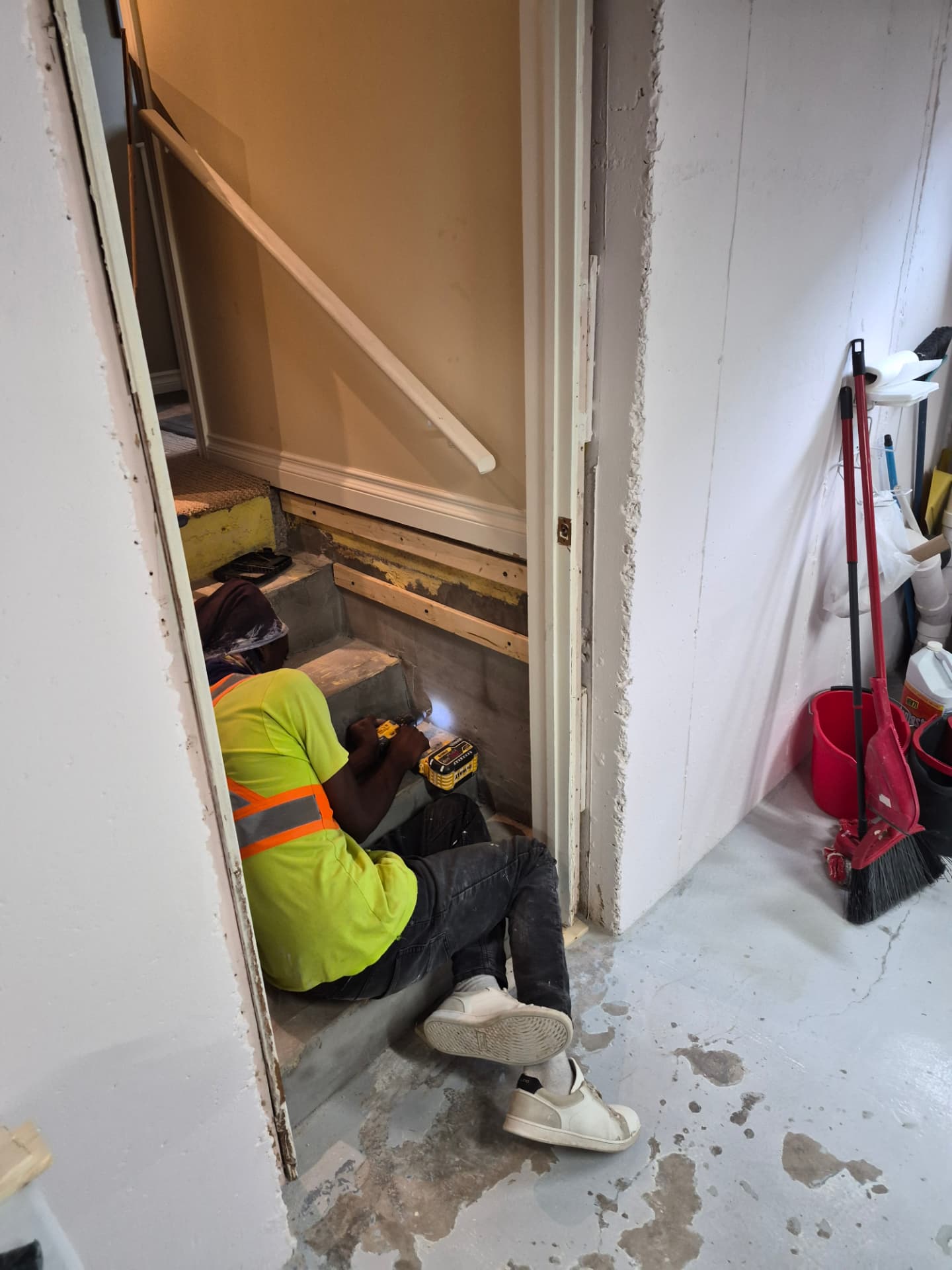 Crew fitting new stairwell framing