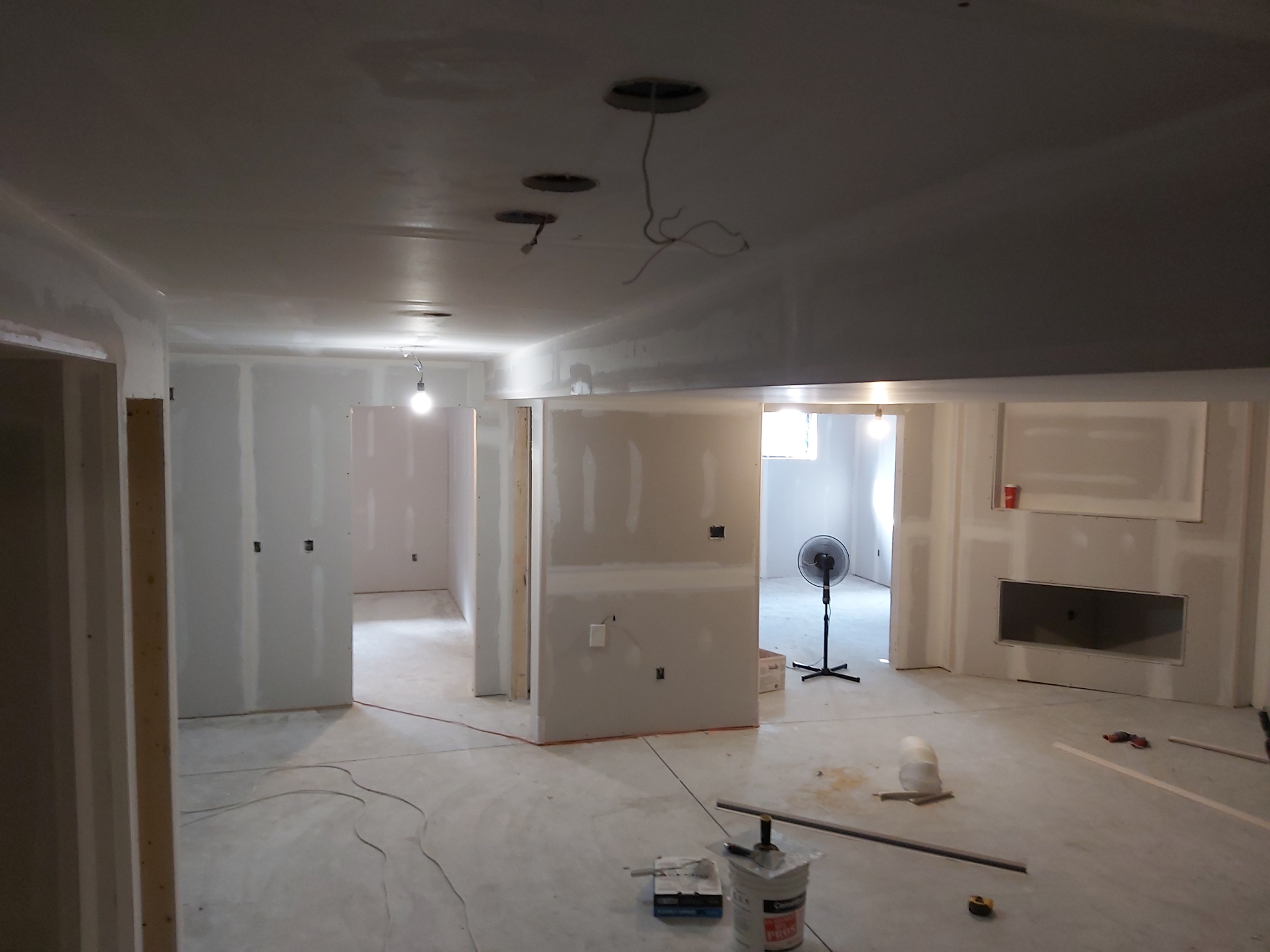 Open basement layout — finish stage