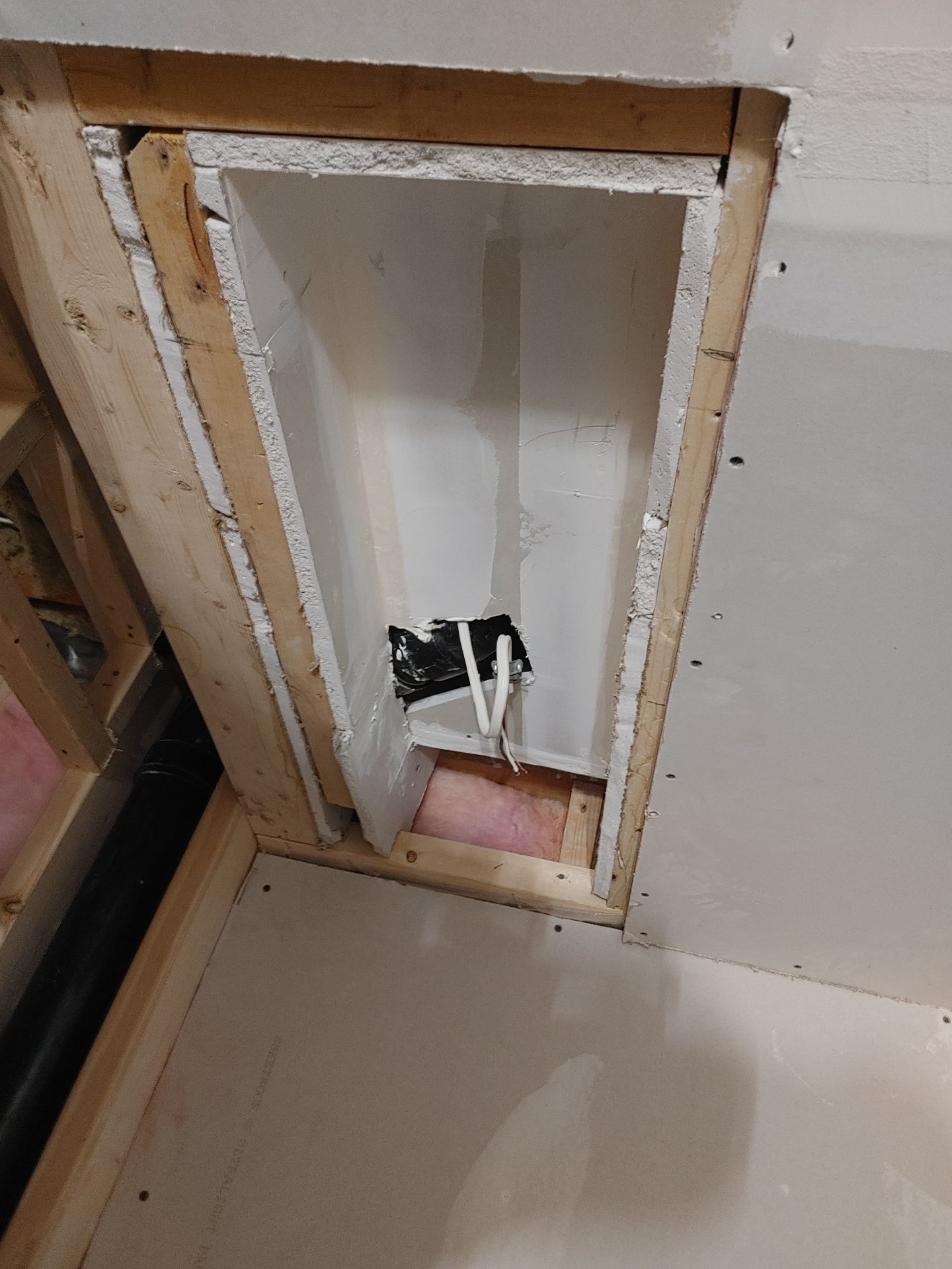 Precision outlet cutout in fresh drywall